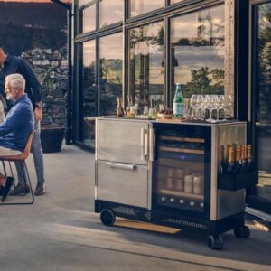 Stainless steel outdoor beverage cart with wine fridge and drawer on rooftop terrace