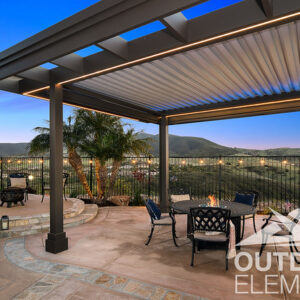 Brown louvered pergola over patio dining set with fire pit at twilight