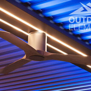 Close-up of wood ceiling fan blade under blue and amber pergola LED lighting