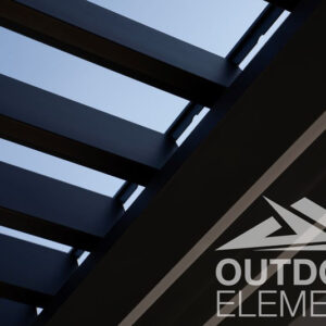 Close-up of open louvered pergola roof slats against blue sky